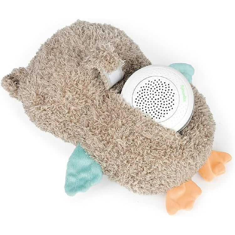 Plush toy with a speaker embedded in it on a white background