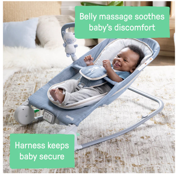 Baby in a blue baby bouncer with text highlighting features