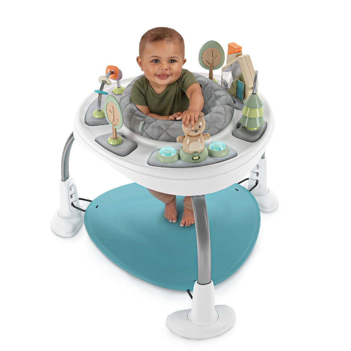 Baby in a activity center with toys on a white background