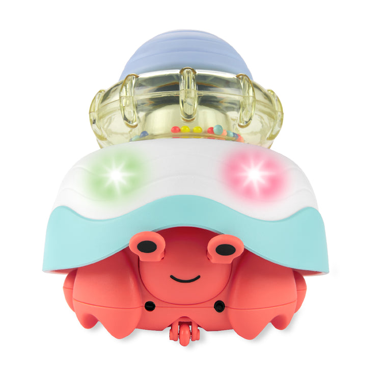 Colorful hermit crab-shaped toy with a transparent shell on a white background