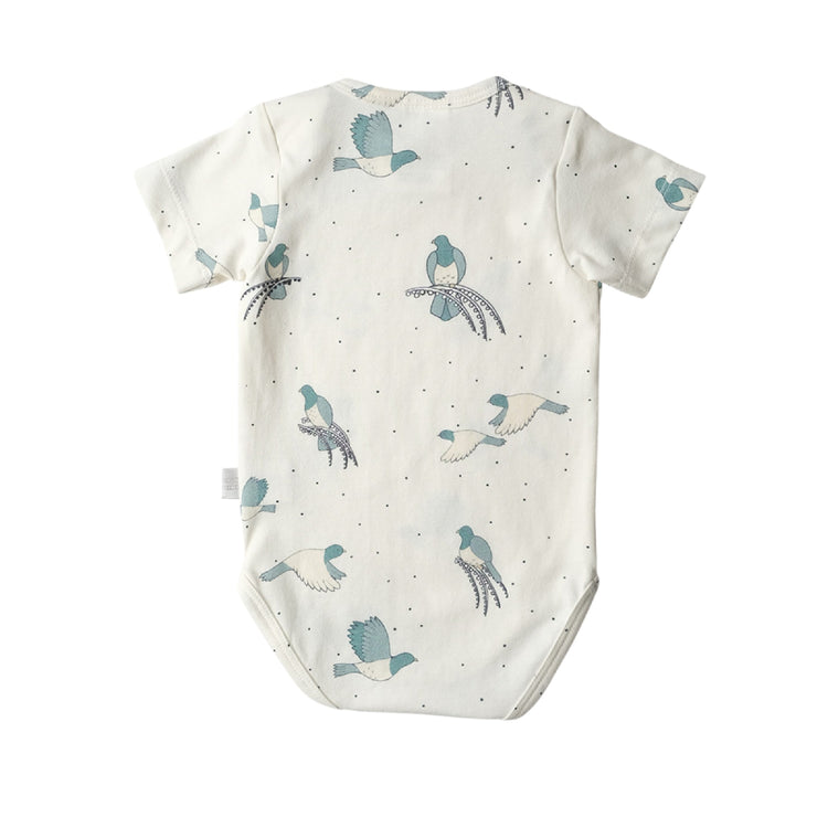 Baby onesie with bird pattern on a white background